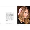 Книга на английском языке "Taylor Swift and the Clothes She Wears", Newman T.  - 6